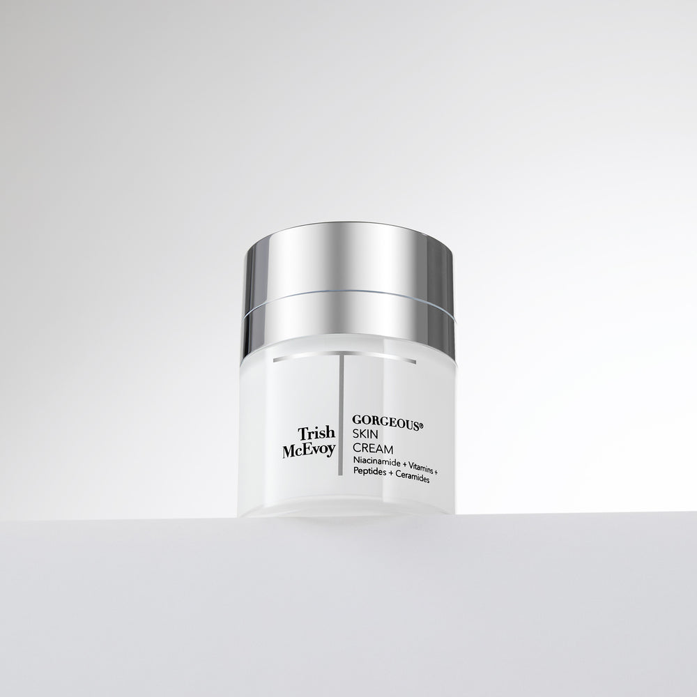 Trish McEvoy skincare jar on a light gray background