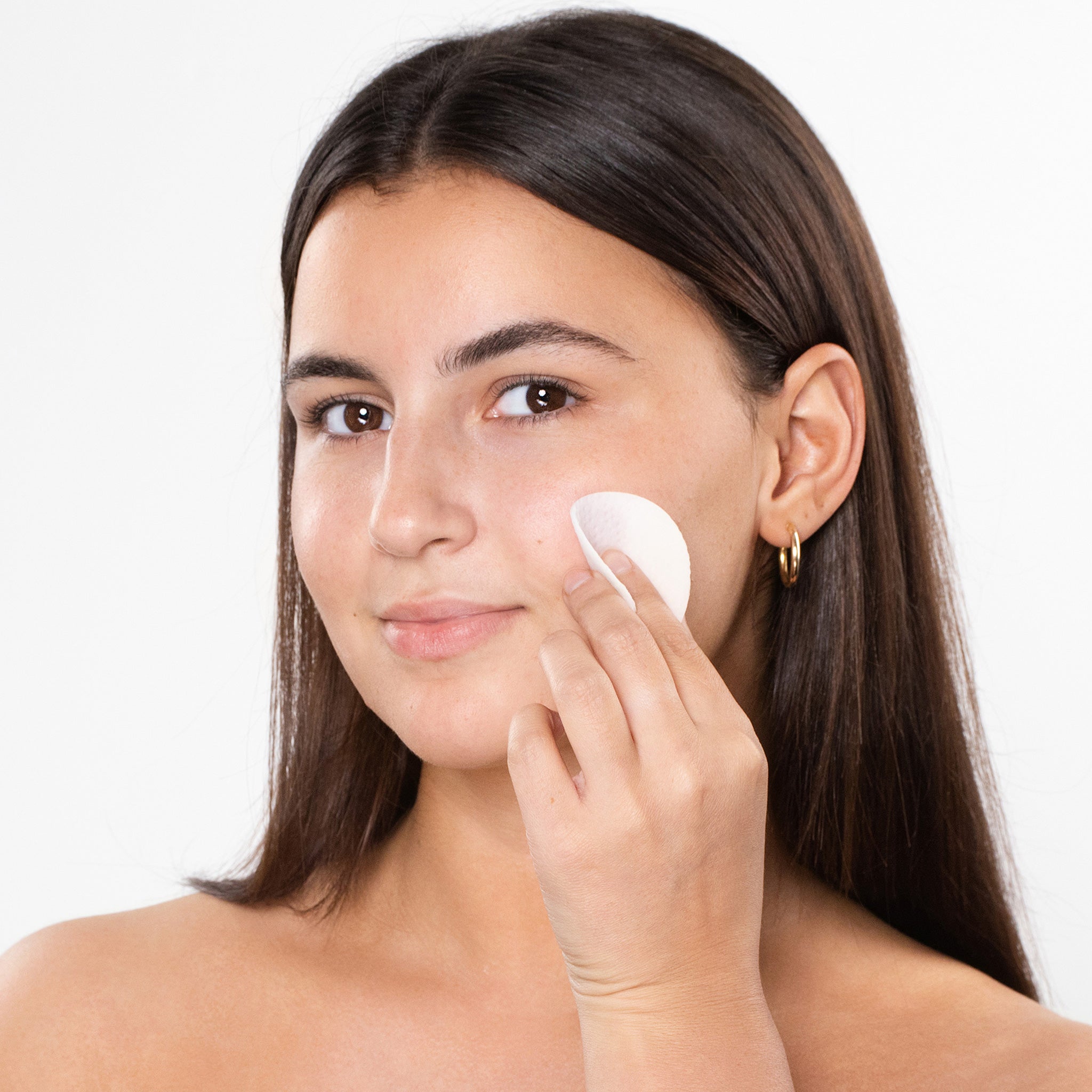 Woman applying BetaHydroxyPads