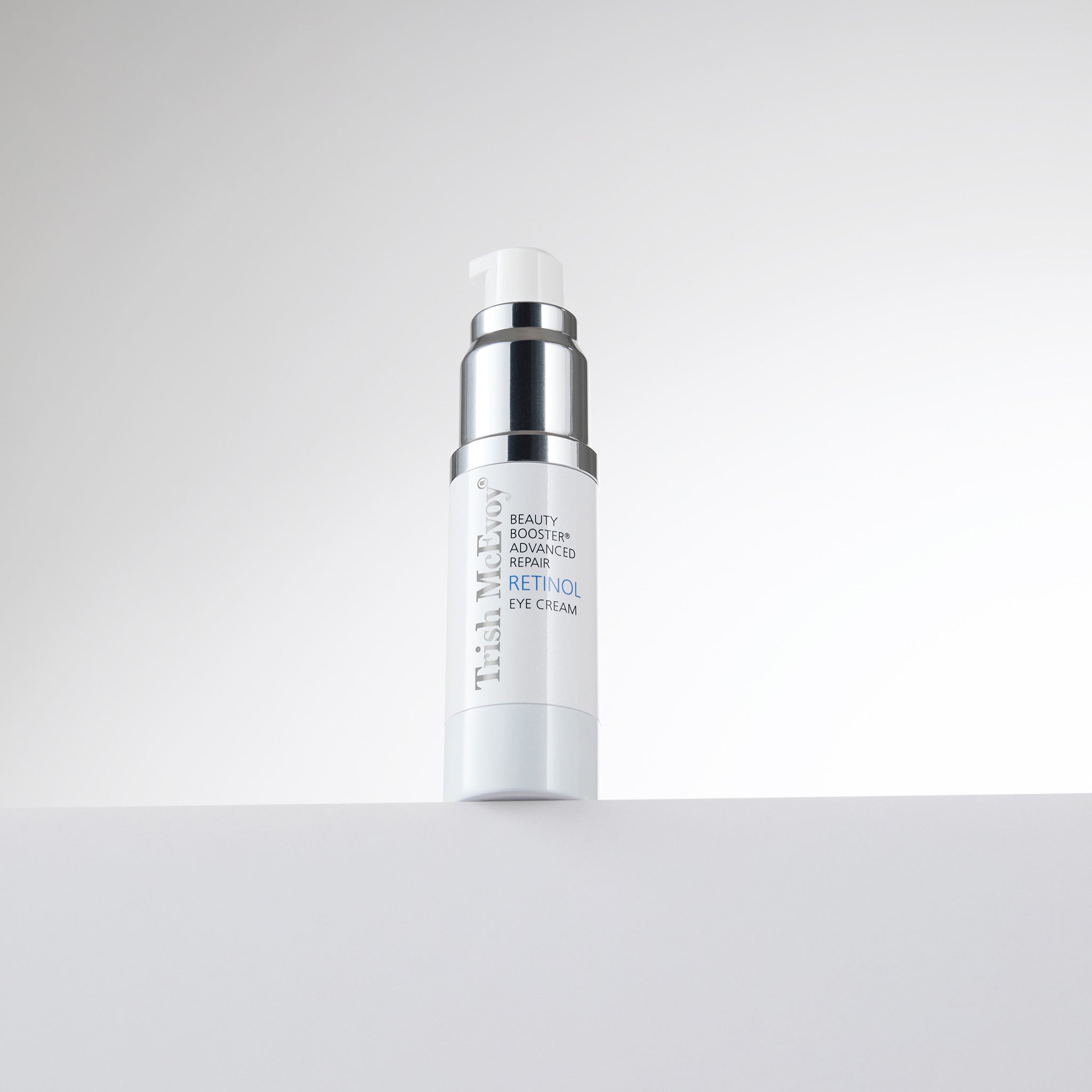Skincare bottle with text on a light gray background