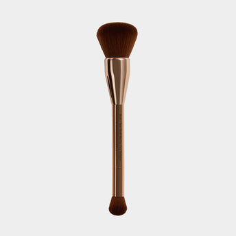 wet dry perfector Makeup brush with brown bristles and gold metallic handle on a white background