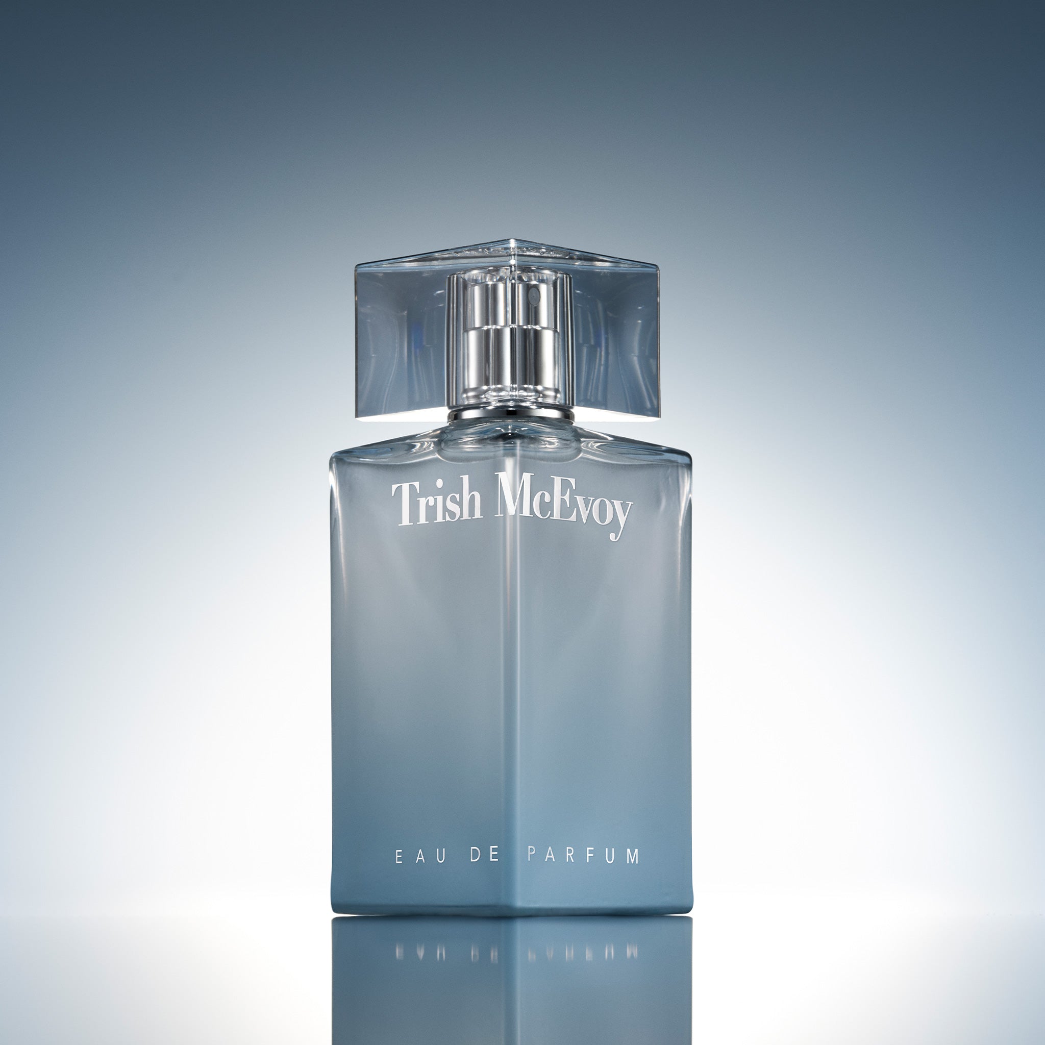 Trish McEvoy Eau de Parfum bottle on a gradient background