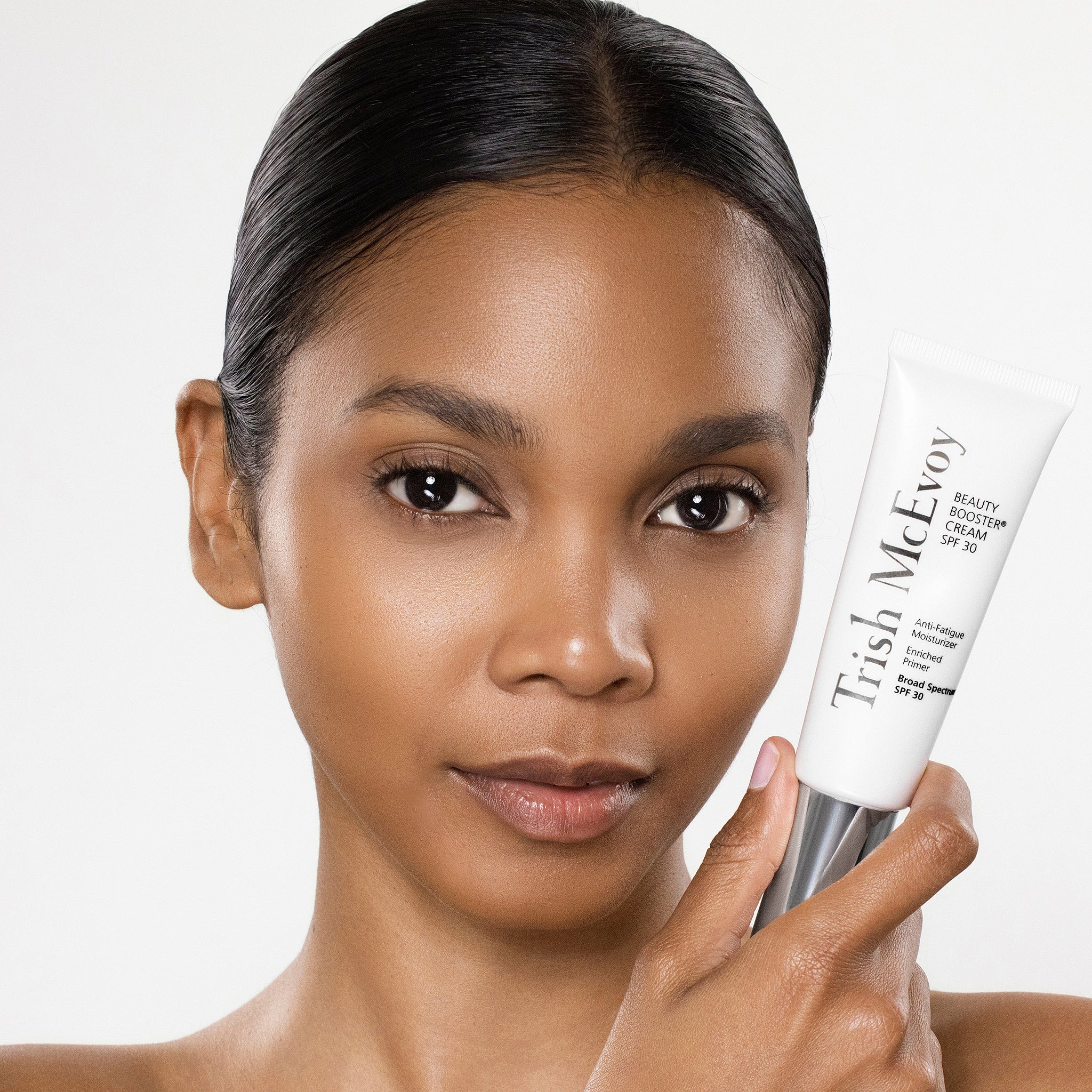 Model holding BB Cream SPF30