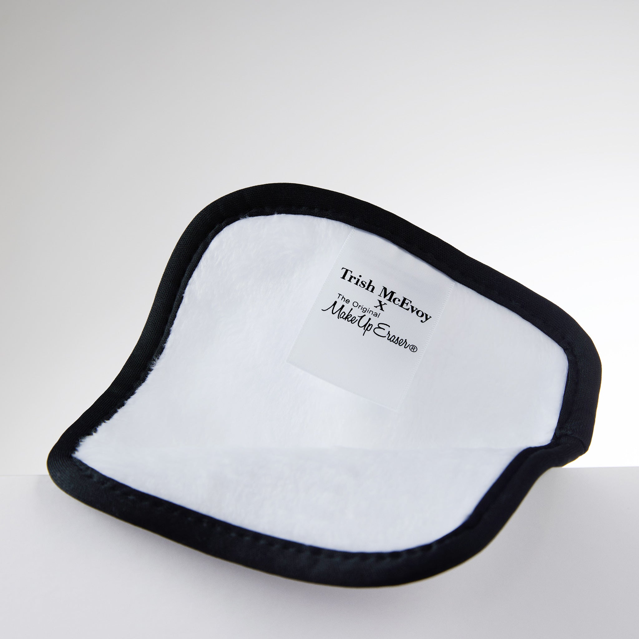 Make-up eraser with black border on a white background