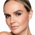 Close-up of a woman's face wearing so glamorous blush