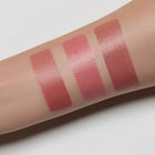blush swatches on a person's arm with 3 different shades.