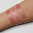 blush swatches on a person's arm with a neutral background