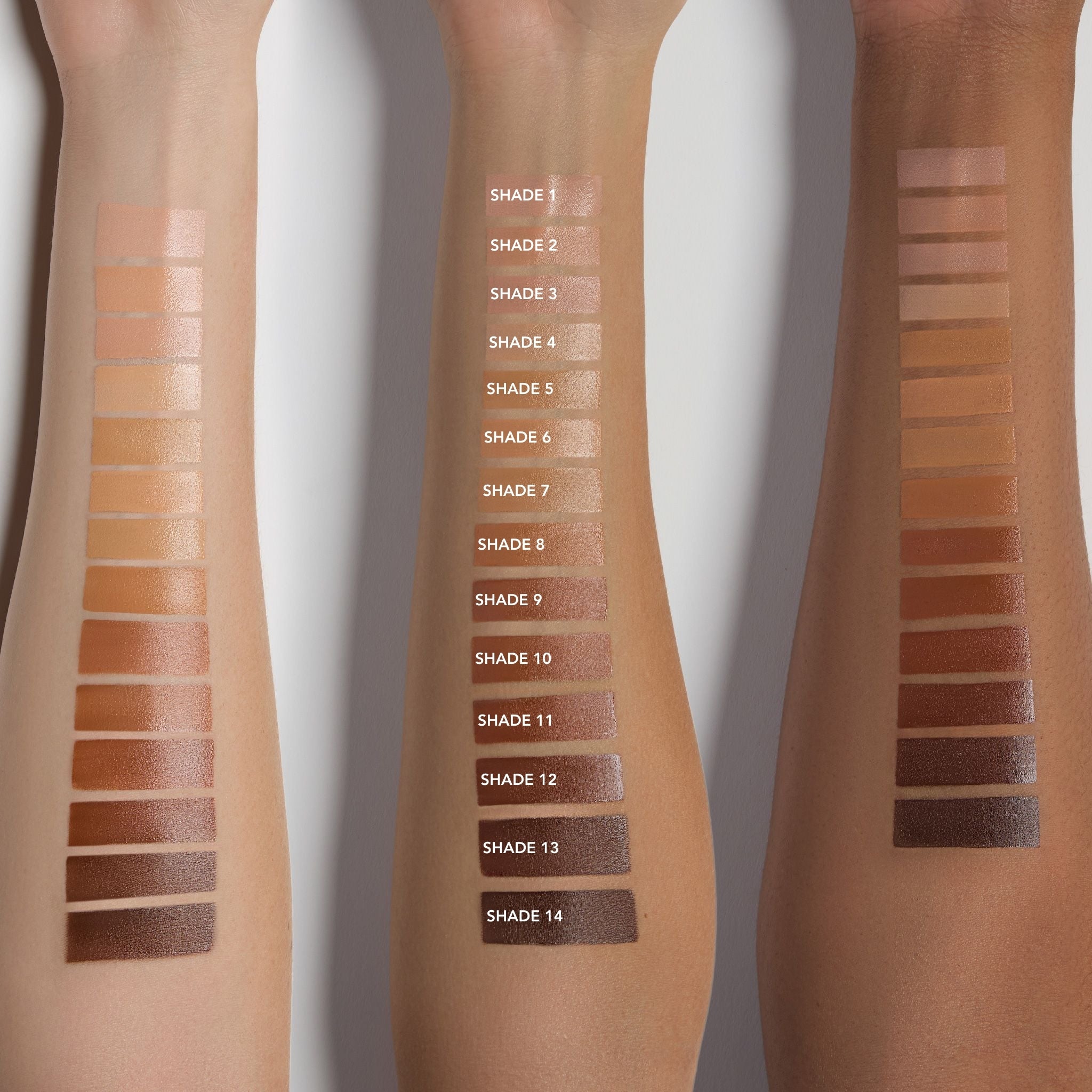 Three different arms showing a color swatch chart on a white background