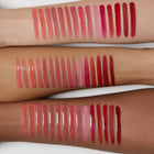 lip gloss swatches on three different skin tones