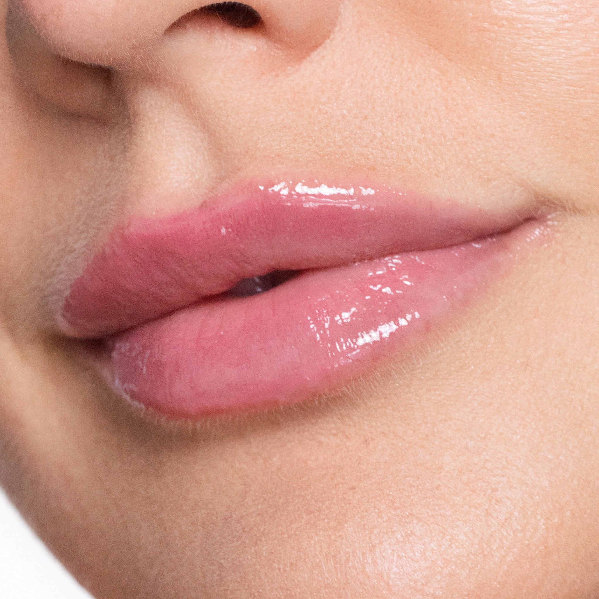 Close-up of a person's lips with color lover lip color