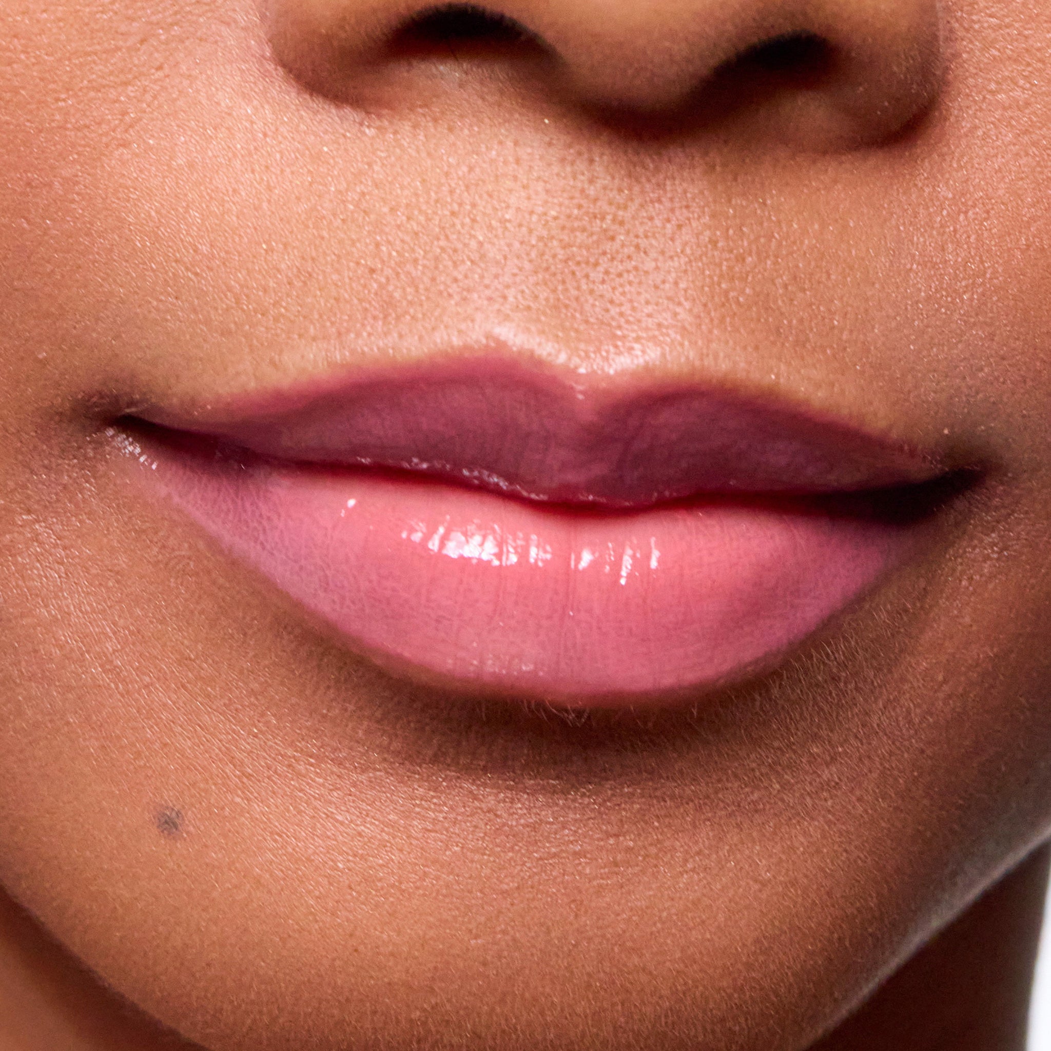 Close-up of a person's lips with color lover lip color