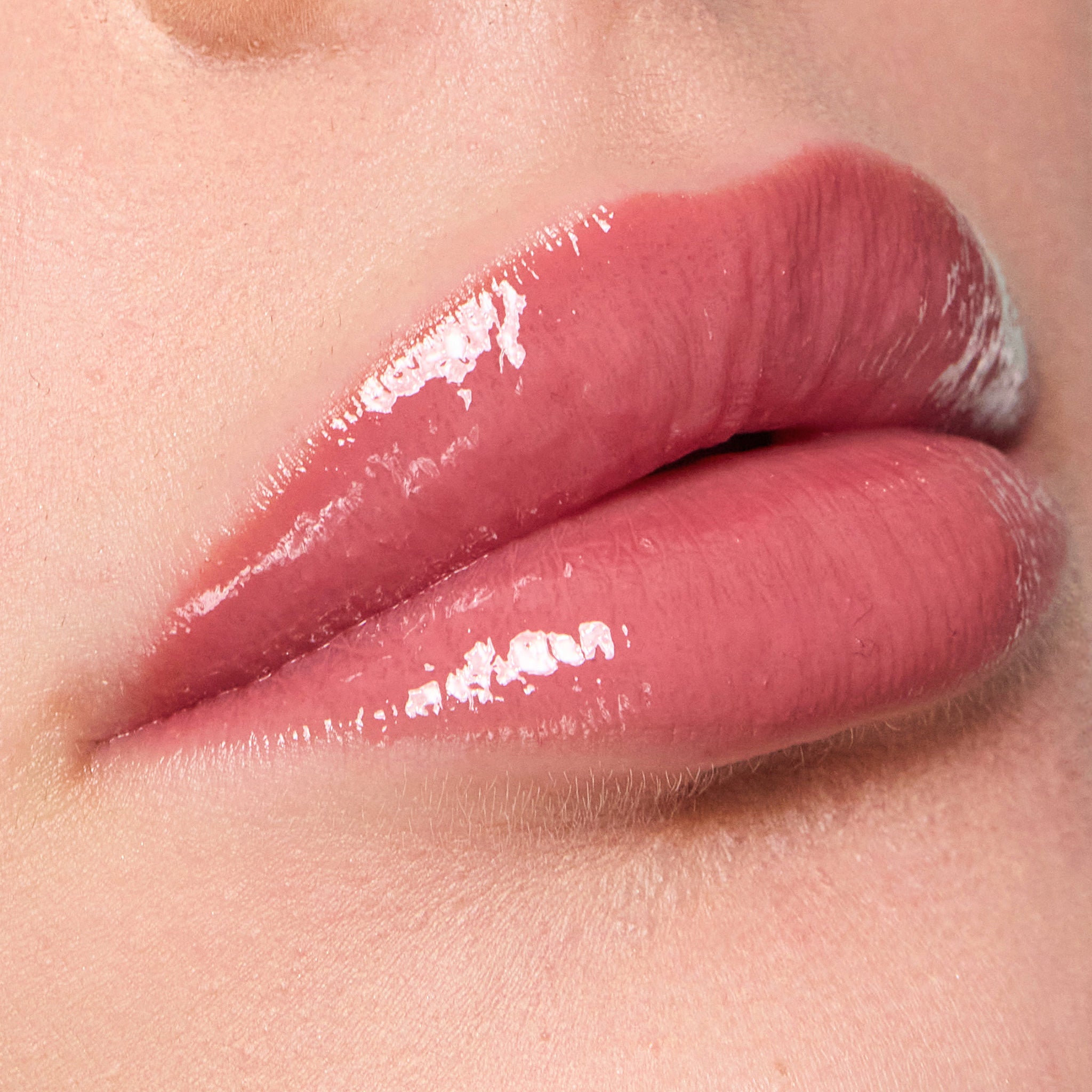 Close-up of a person's lips with color lover lip color