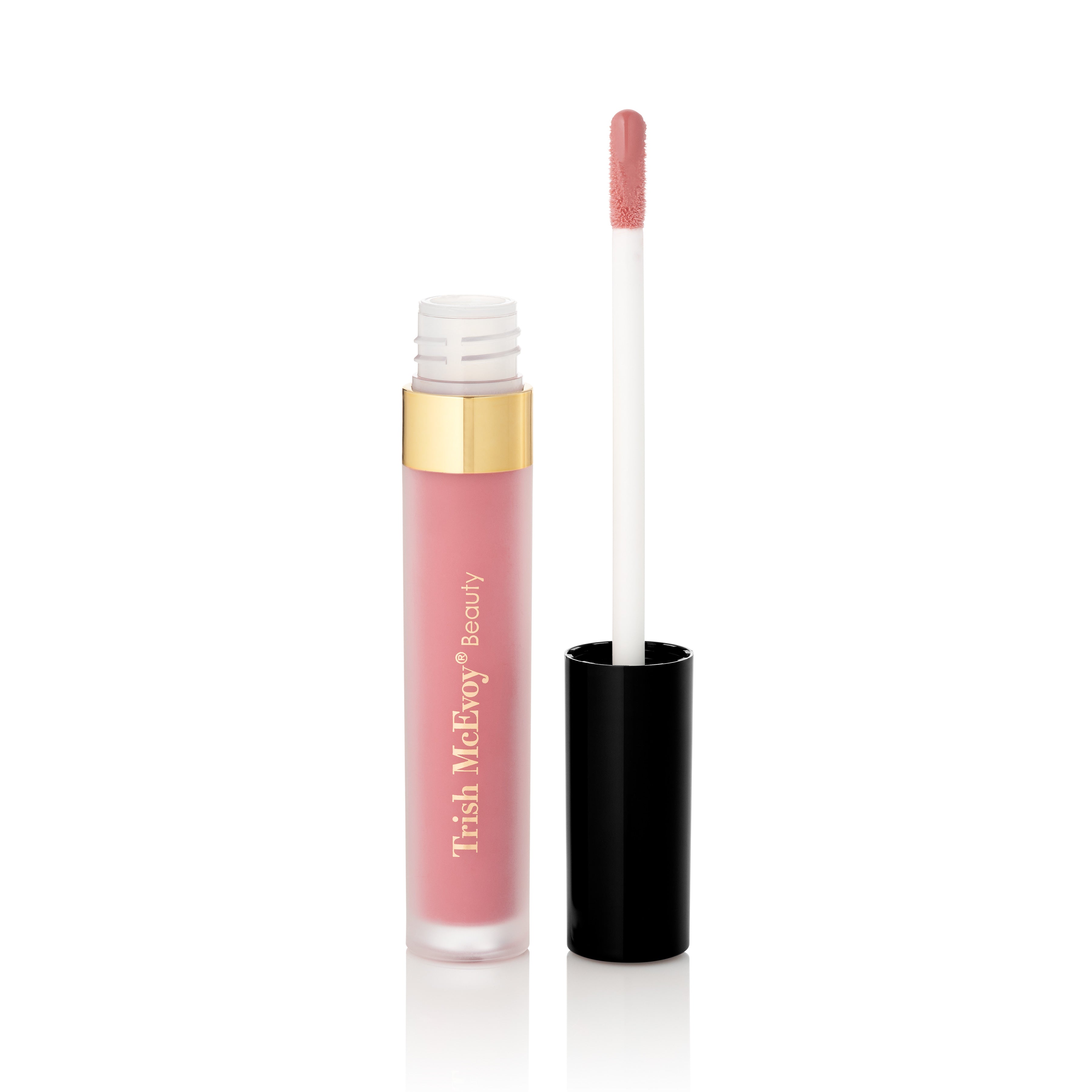 Lip gloss with applicator on a white background, featuring the Trish McEvoy brand.