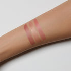 swatches on a person's arm with a light background
