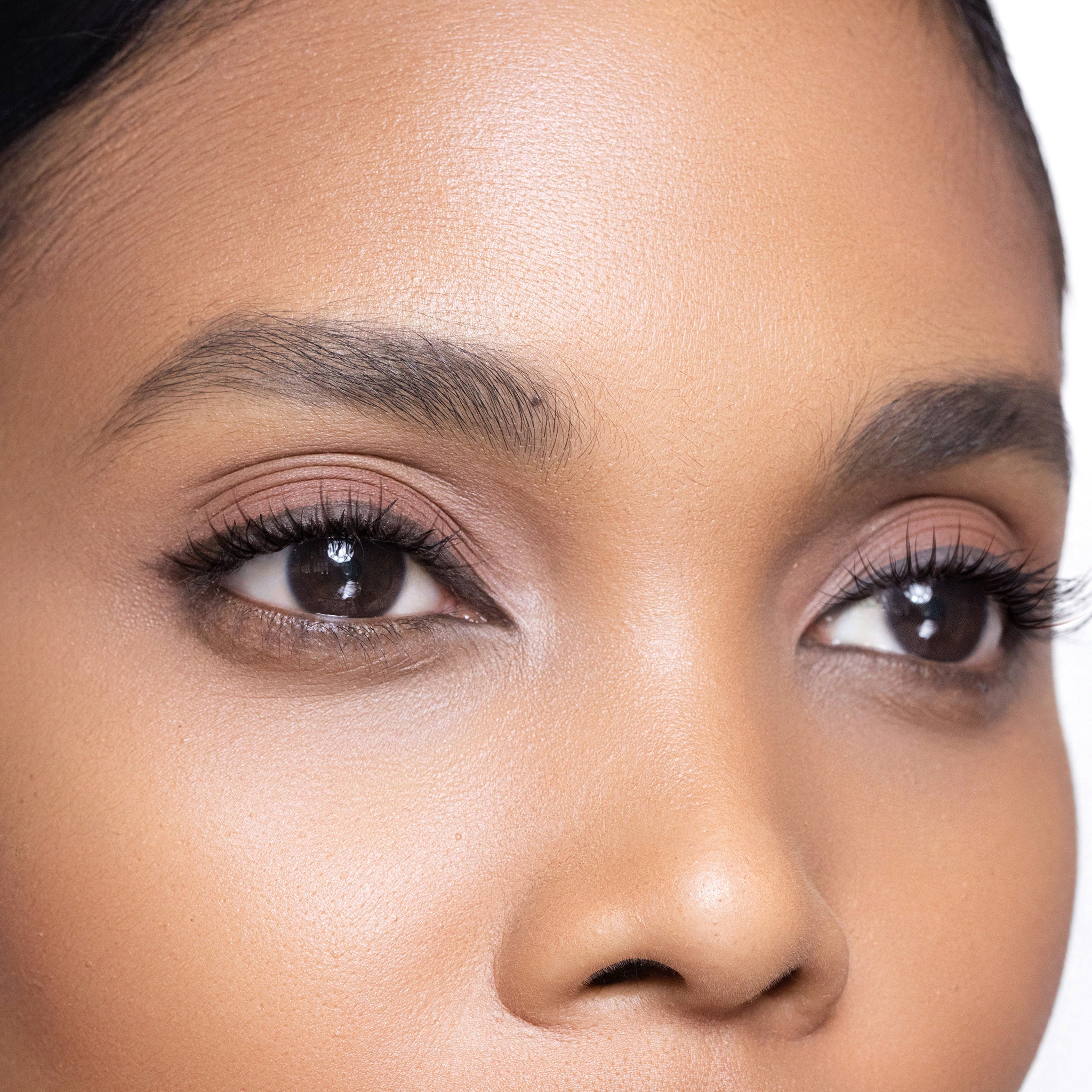 Close-up of a woman's with color rich brown eye definer