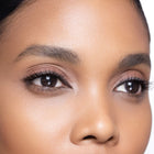 Close-up of a woman's with color rich brown eye definer