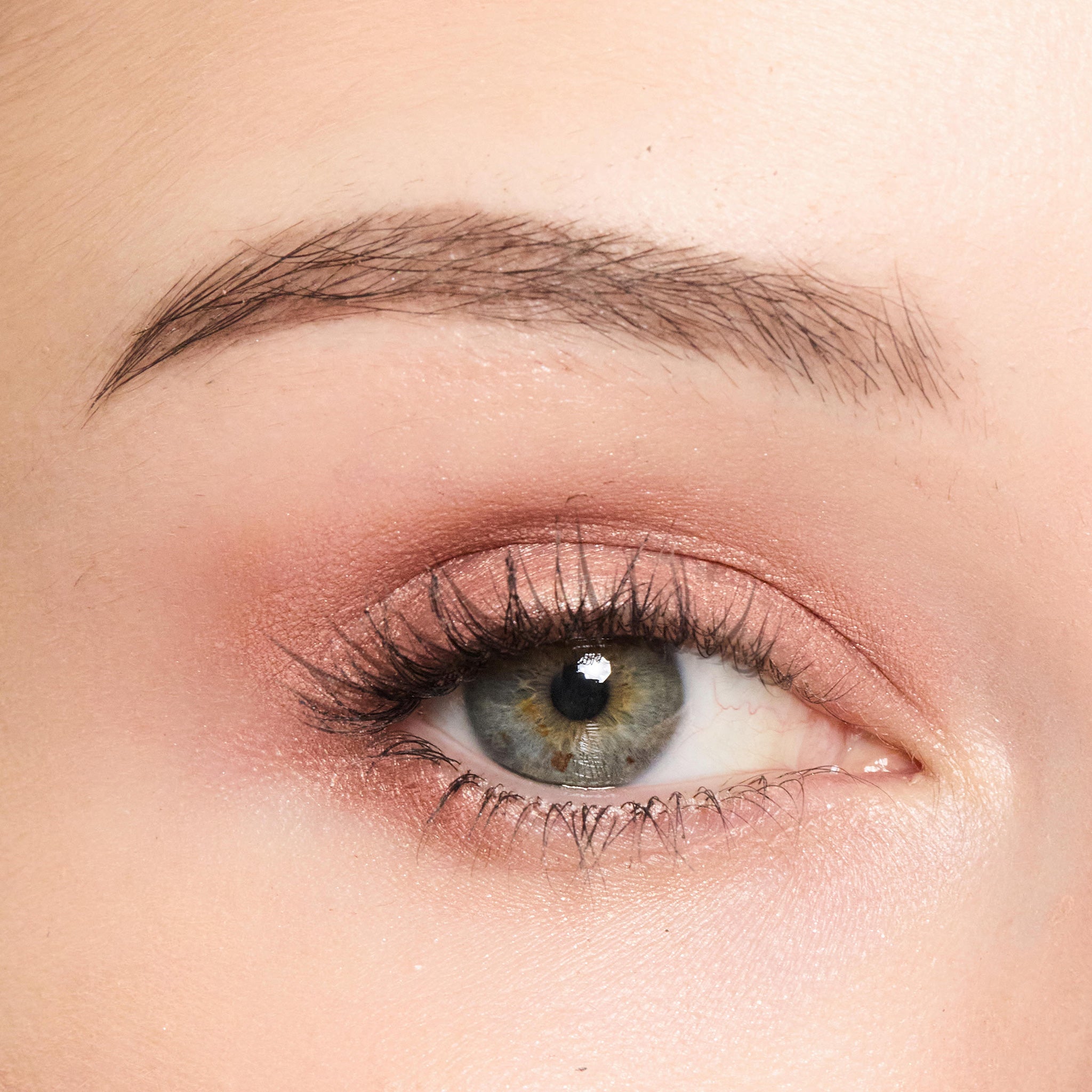 Close-up of a person's eye with Color Rose Quartz makeup