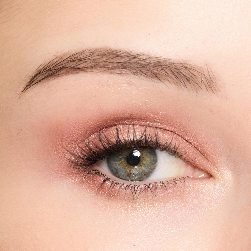 Close-up of a person's eye with Color Rose Quartz makeup
