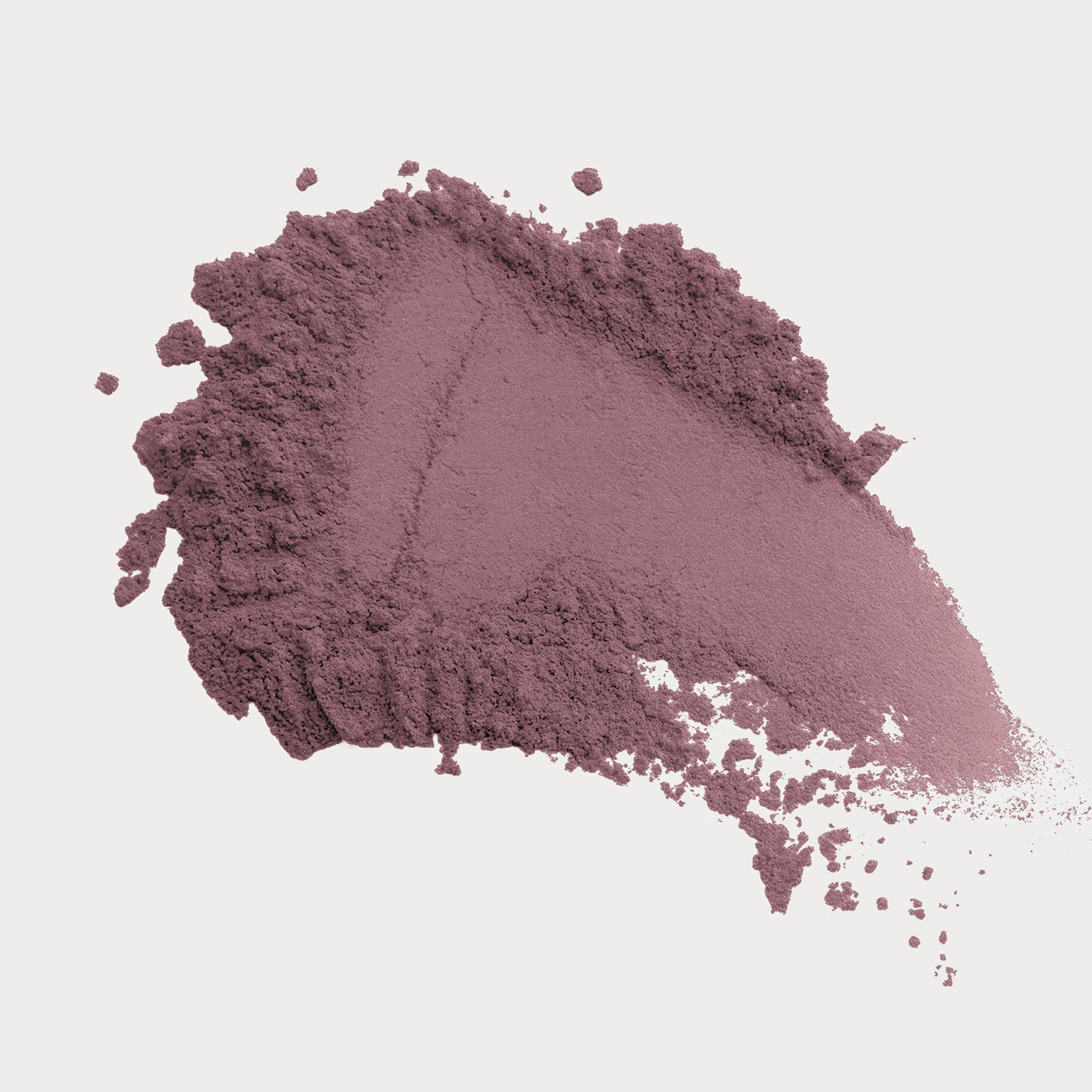 Purple powder on a light pink background