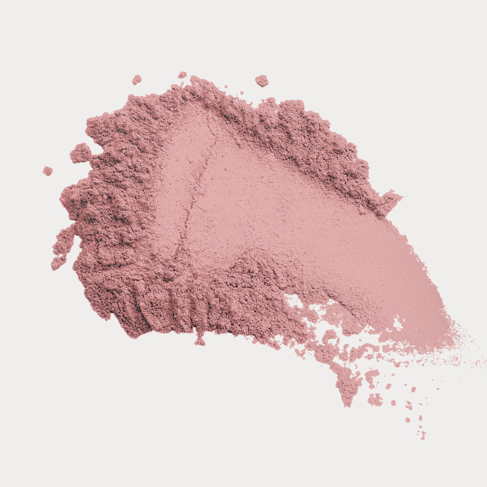 Pink makeup powder on a light pink background
