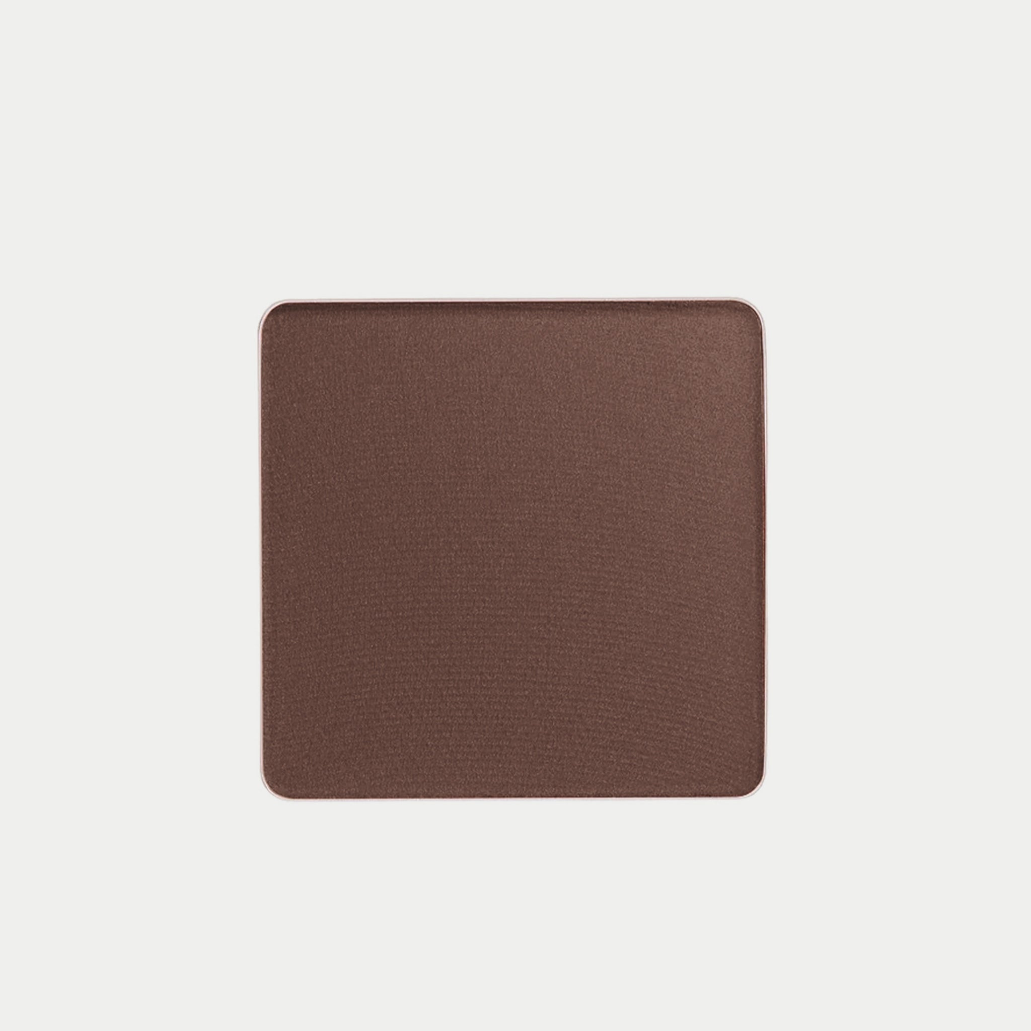 Brown square mat on a light beige background