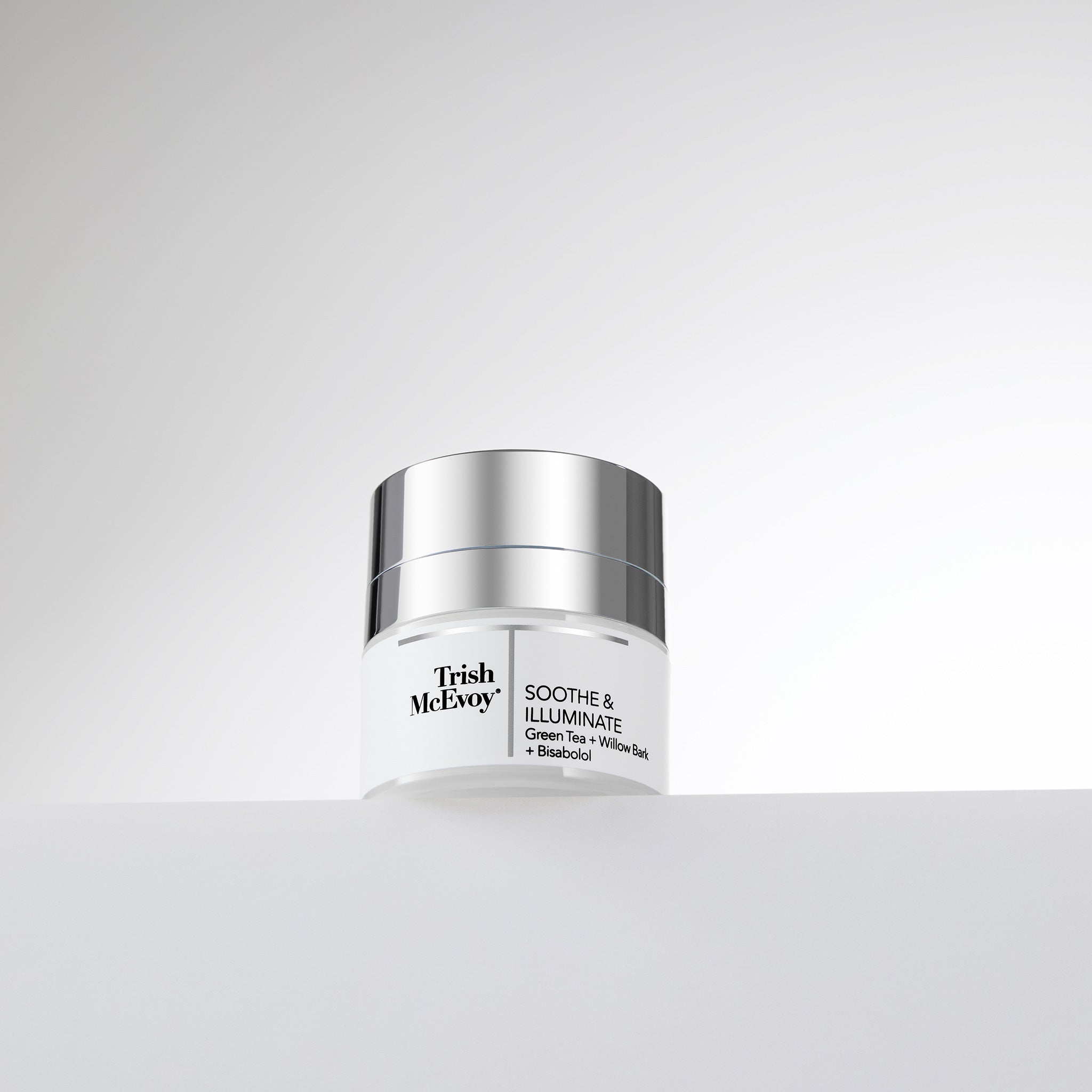 Trish McEvoy skincare jar on a light gray background