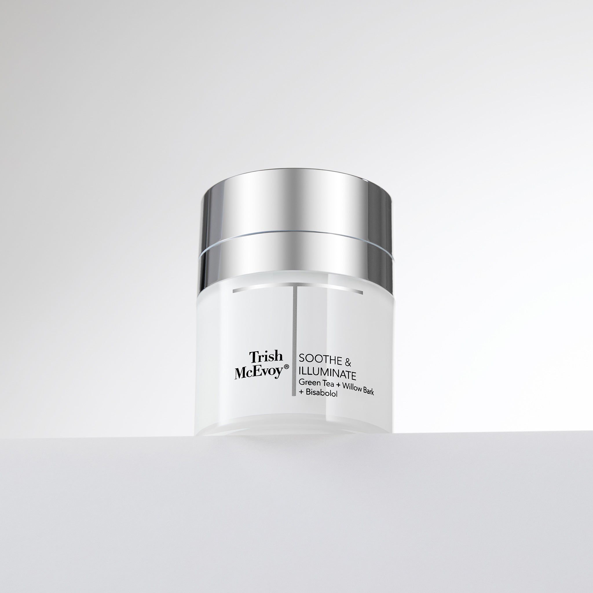 Trish McEvoy skincare jar on a light gray background