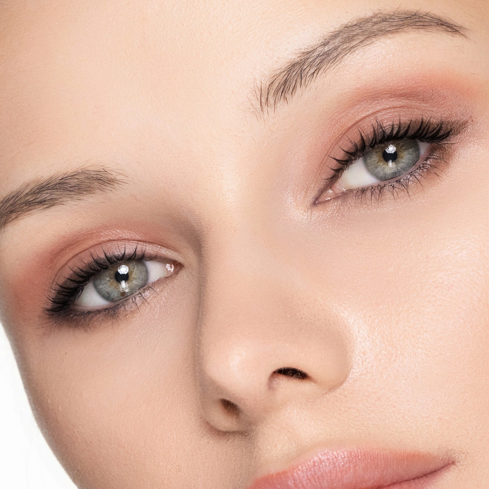 Close-up of a woman's face wearinf color fearless eye shadow makeup