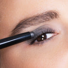 Crystal Gray Eyeliner being applied to an eye with a close-up view.