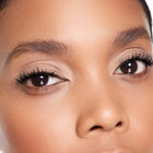 Close-up of a person's eyes with color bobe eyeshadow makeup