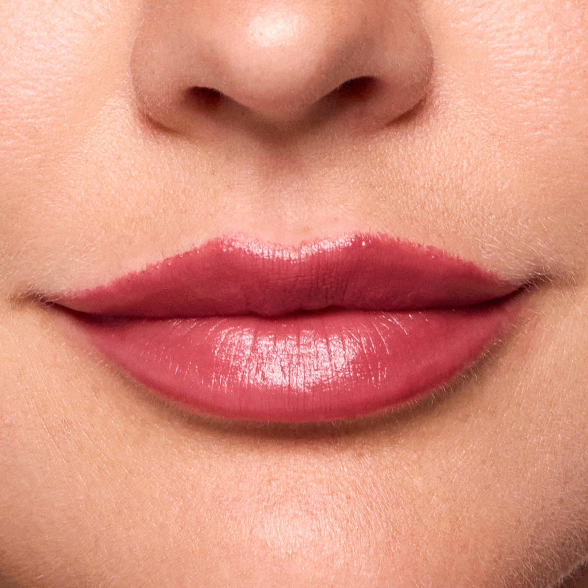Close-up of a person's lips with a color merlot lipstick