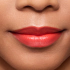 Close-up of a person's lips with a color beautiful lipstick