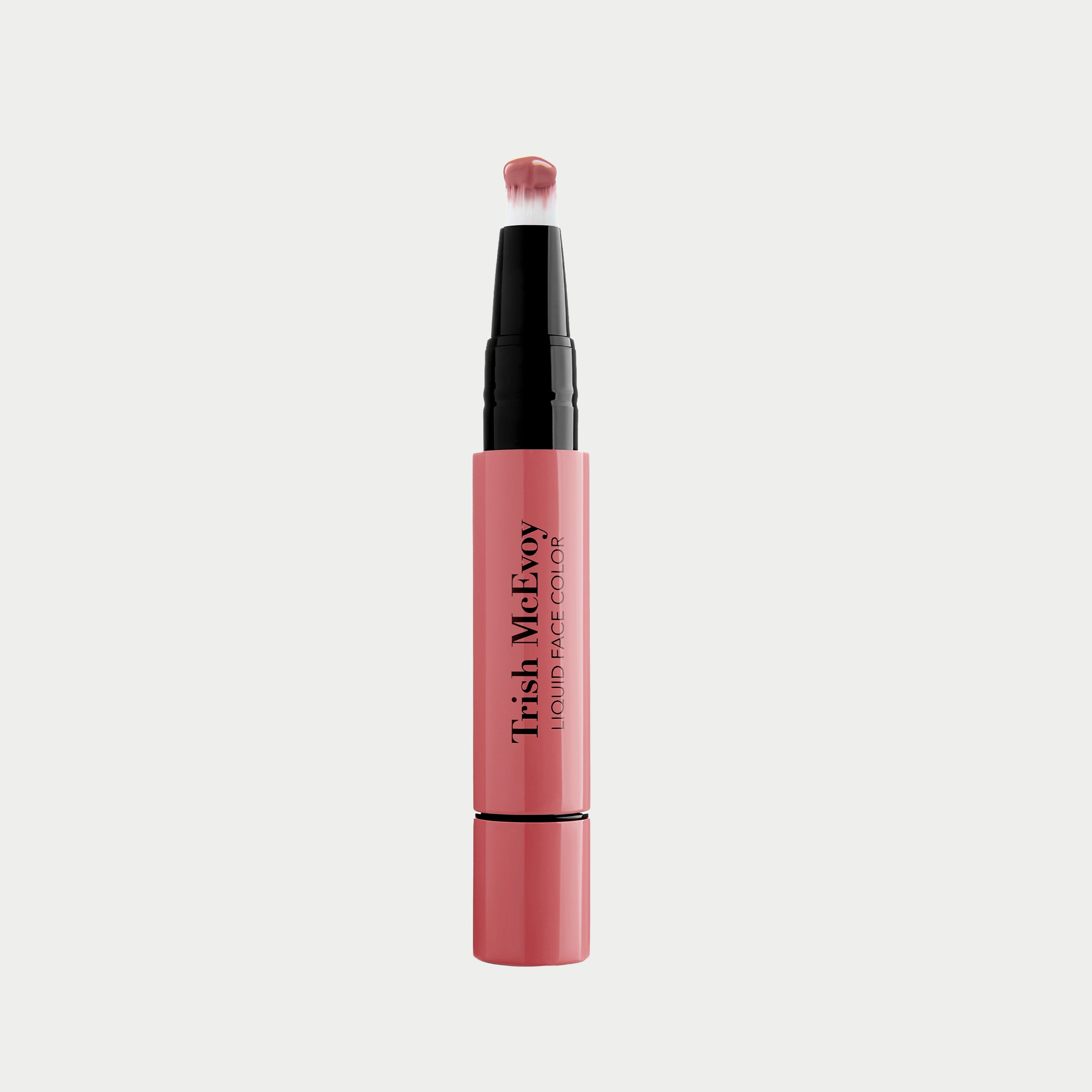 Pink blush with black cap on a white background